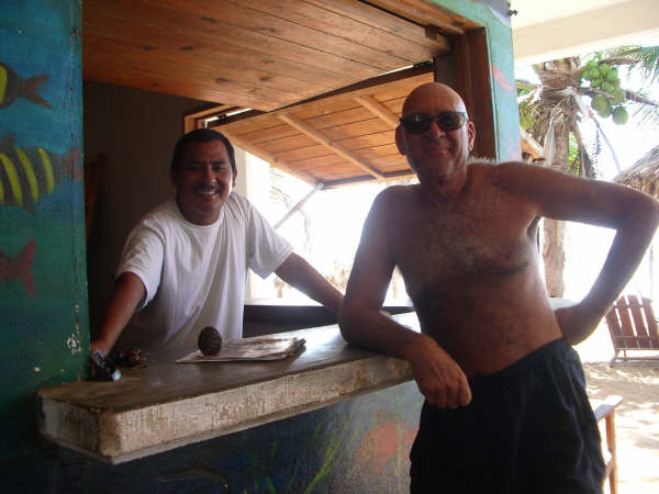 Posada Brisa Marina owner and manager enjoying the shade.